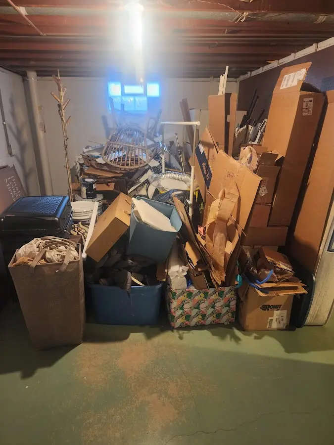 Roll-off dumpster container at job site for 8 Yard Dumpster Rental in Mason